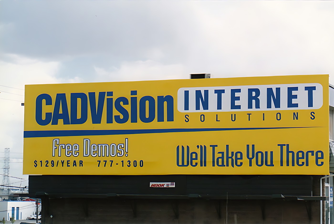 Of a large yellow billboard with the words "CADVISION INTERNET SOLUTIONS