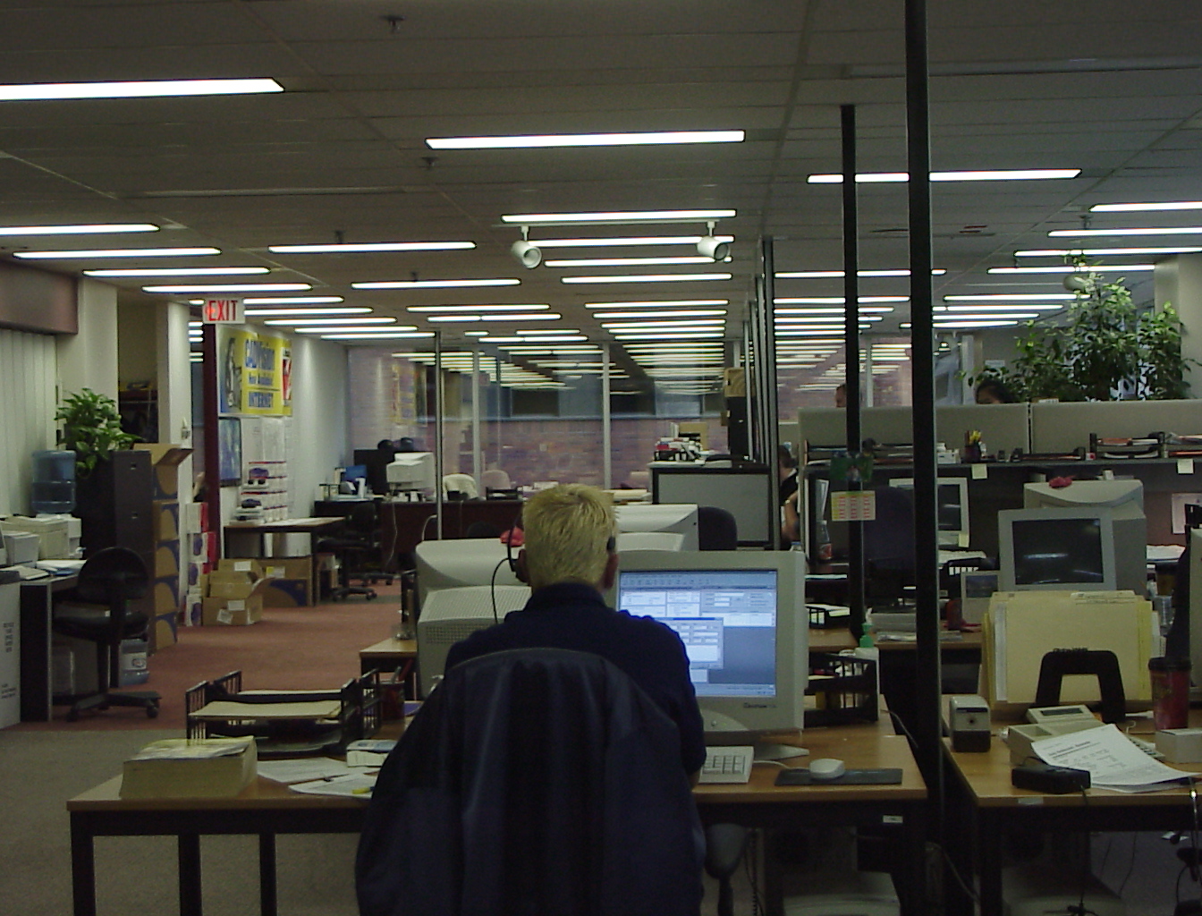 The floor from the back — headset on, the whole room in view